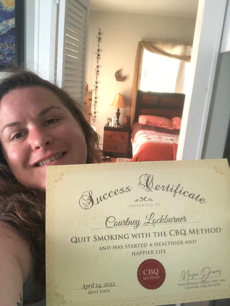 Courtney Lockburner holding her CBQ Success Certificate
