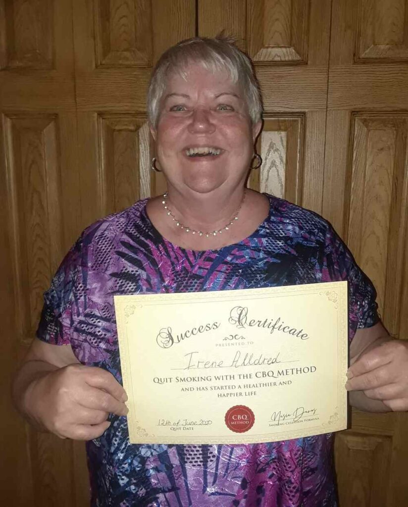 Irene Alldred holding her CBQ Success Certificate