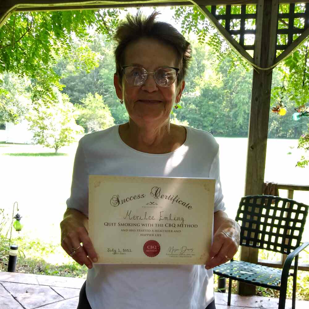 Merilee Emling holding her CBQ Success Certificate