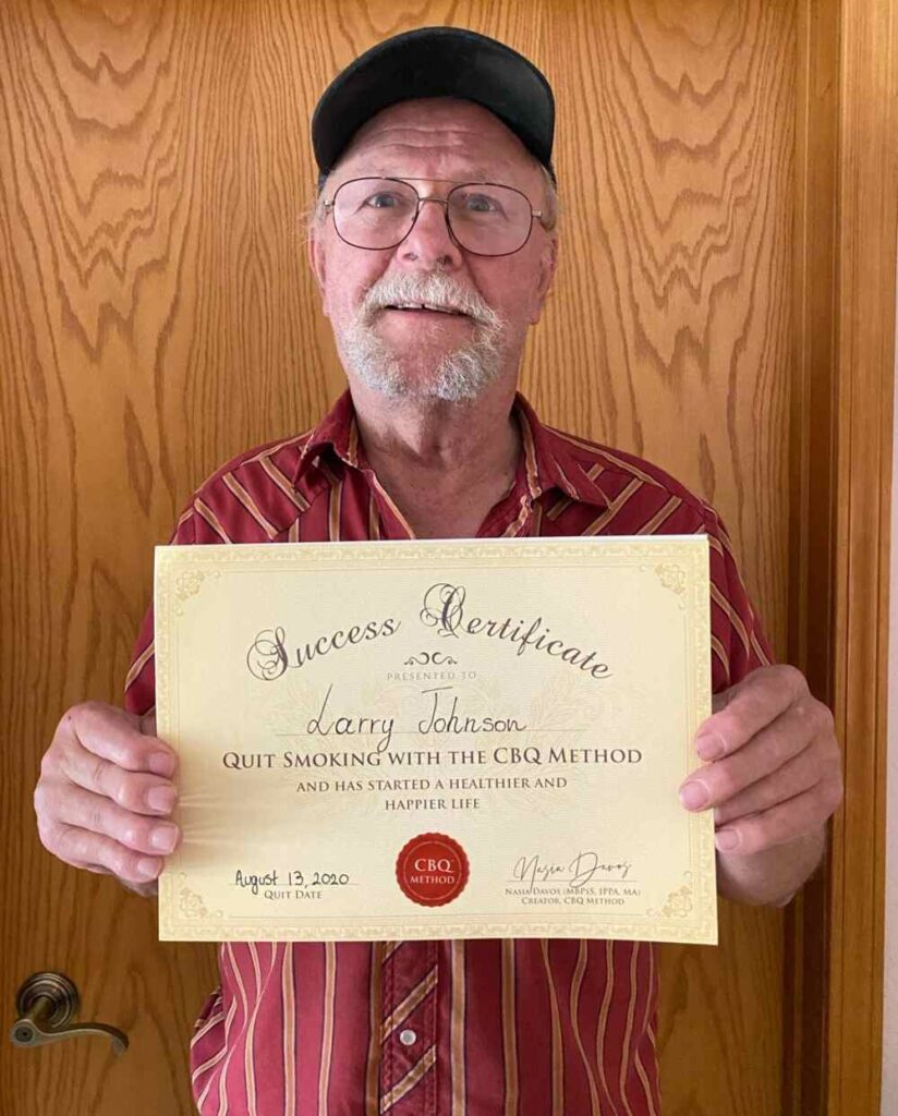 Larry Johnson holding his CBQ Success Certificate