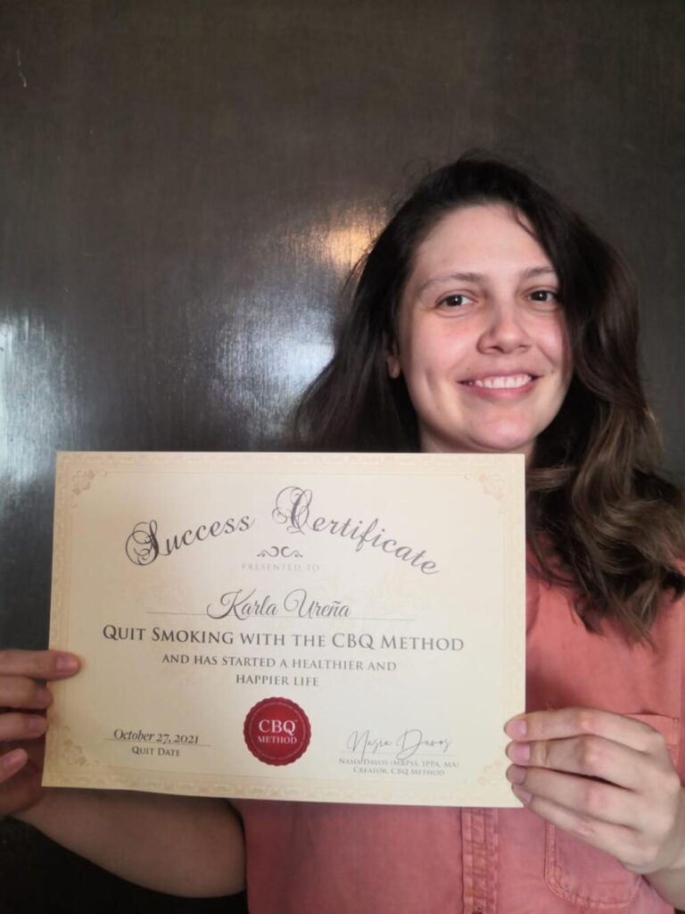 Karla Urena holding her CBQ Success Certificate