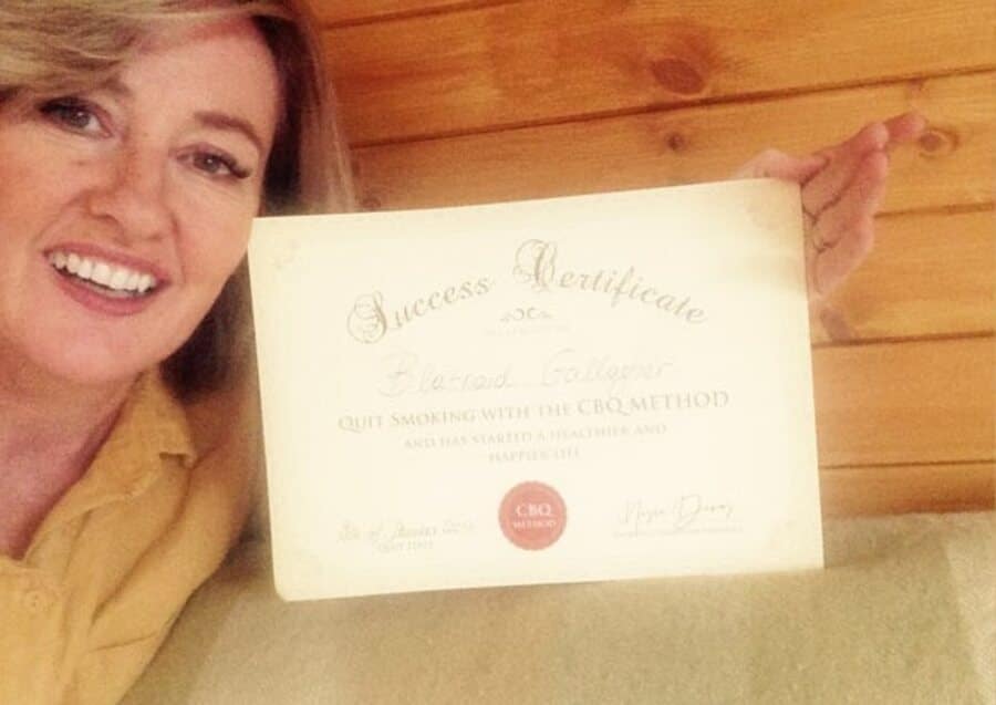 CBQ Program member Blatnaid Gallagher holding her CBQ Success Certificate