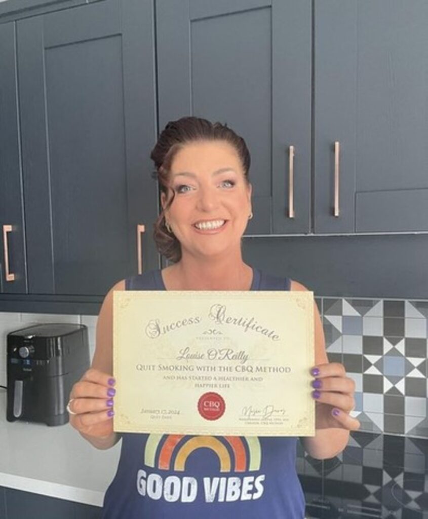 Louise O'Reilly holding her CBQ Success Certificate