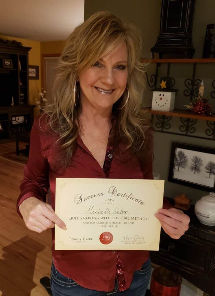 Michelle Weber holding her CBQ Success Certificate