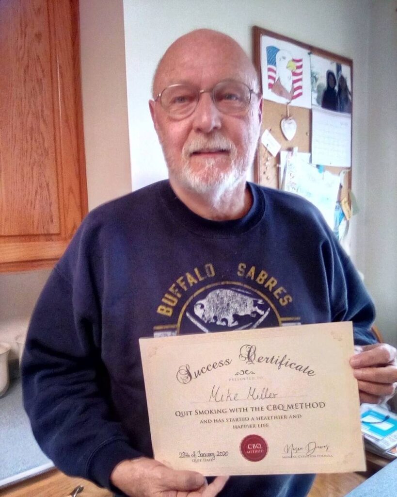 Mike Miller holding his CBQ Success Certificate