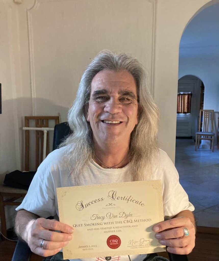 Tracy Van Dyke holding his CBQ Quit Smoking Success Certificate