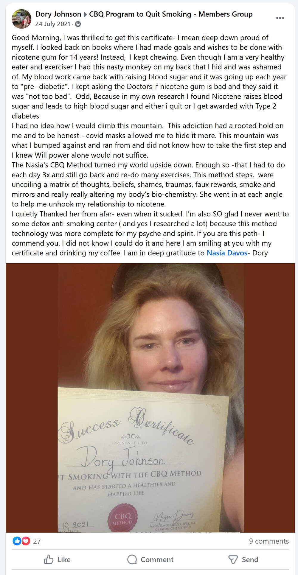Dory Johnson holding her CBQ Success Certificate