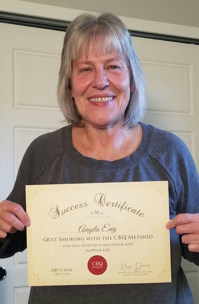 Angela Eng holding her CBQ Success Certificate
