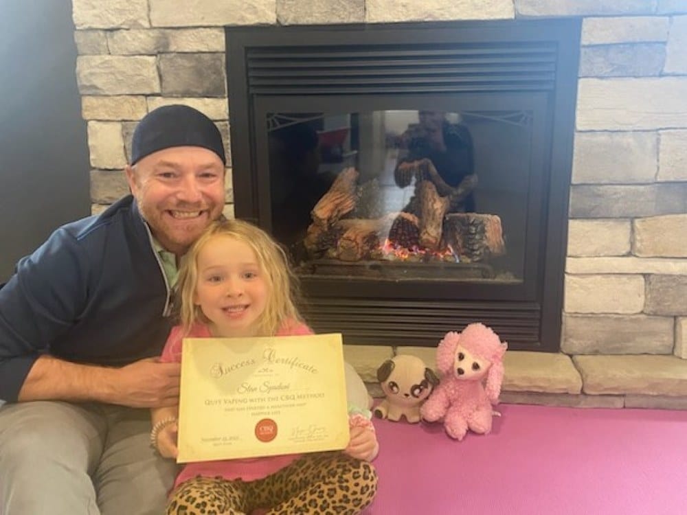 Stan Spadoni holding his CBQ Success Certificate