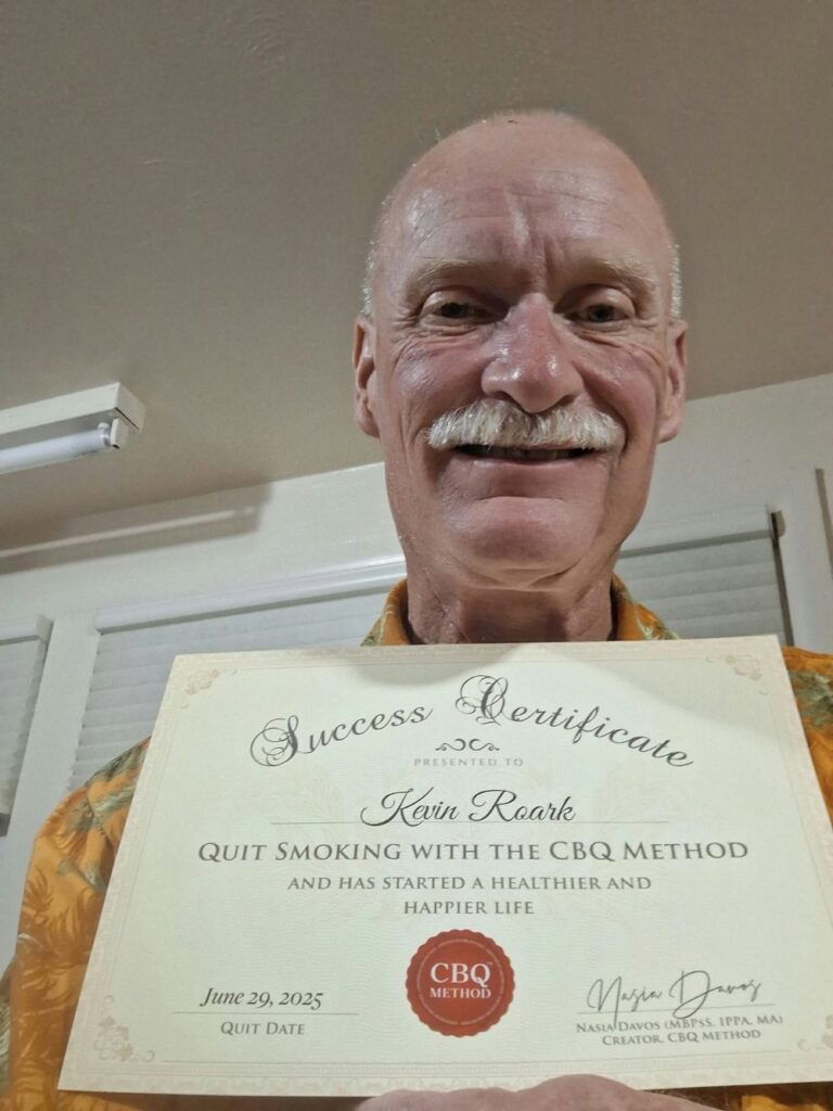 Kevin Roark holding his CBQ Success Certificate