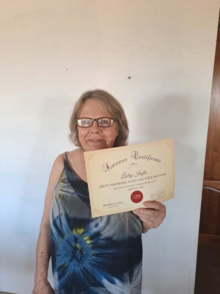 Lesley Inglis holding her CBQ Success Certificate
