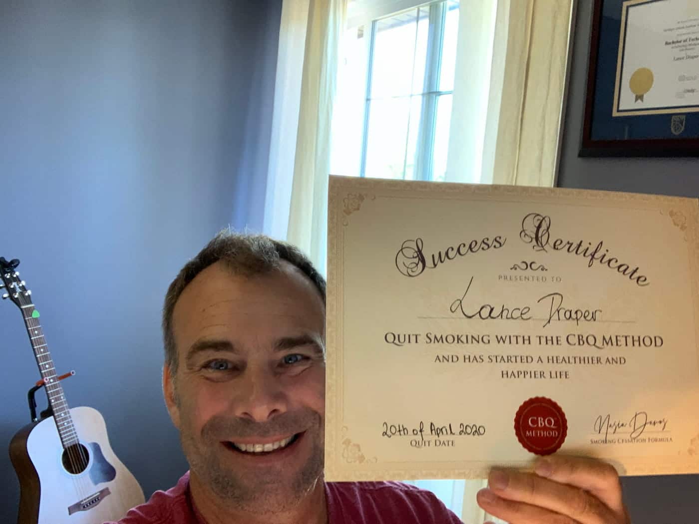 CBQ Nicotine Freedom Program member Lance Draper holding his CBQ Success Certificate