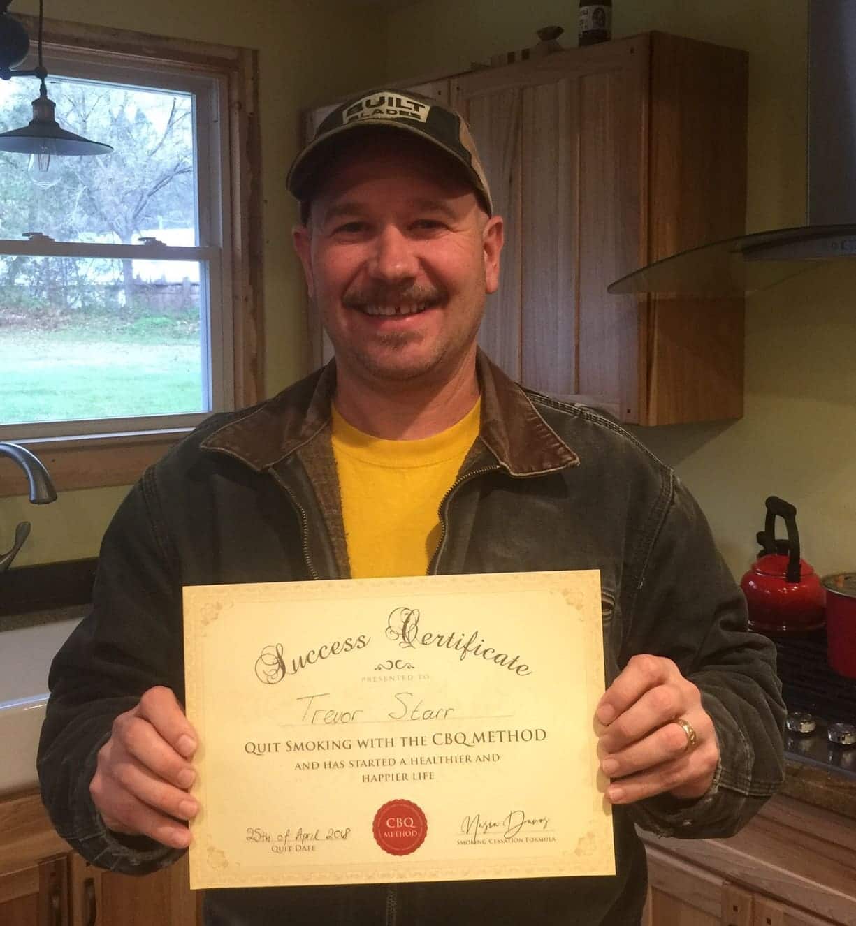CBQ Nicotine Freedom Program member Trevor Starr Holding His CBQ Success Certificate