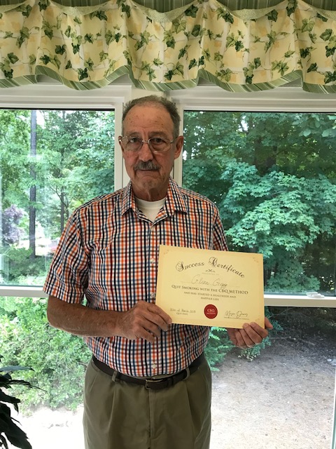 CBQ Nicotine Freedom Member Glenn Greg Holding His CBQ Success Certificate