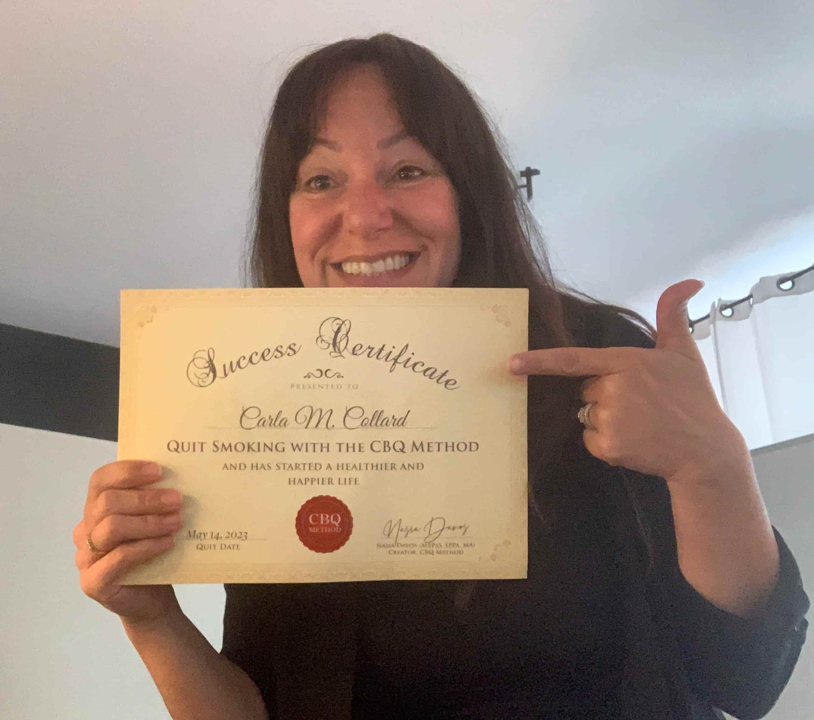 CBQ Nicotine Freedom Program member Carla Collard holding her CBQ Success Certificate