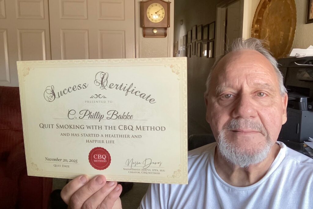 CBQ Nicotine Freedom Program member Christian Phillip Bakke holding his CBQ Success Certificate