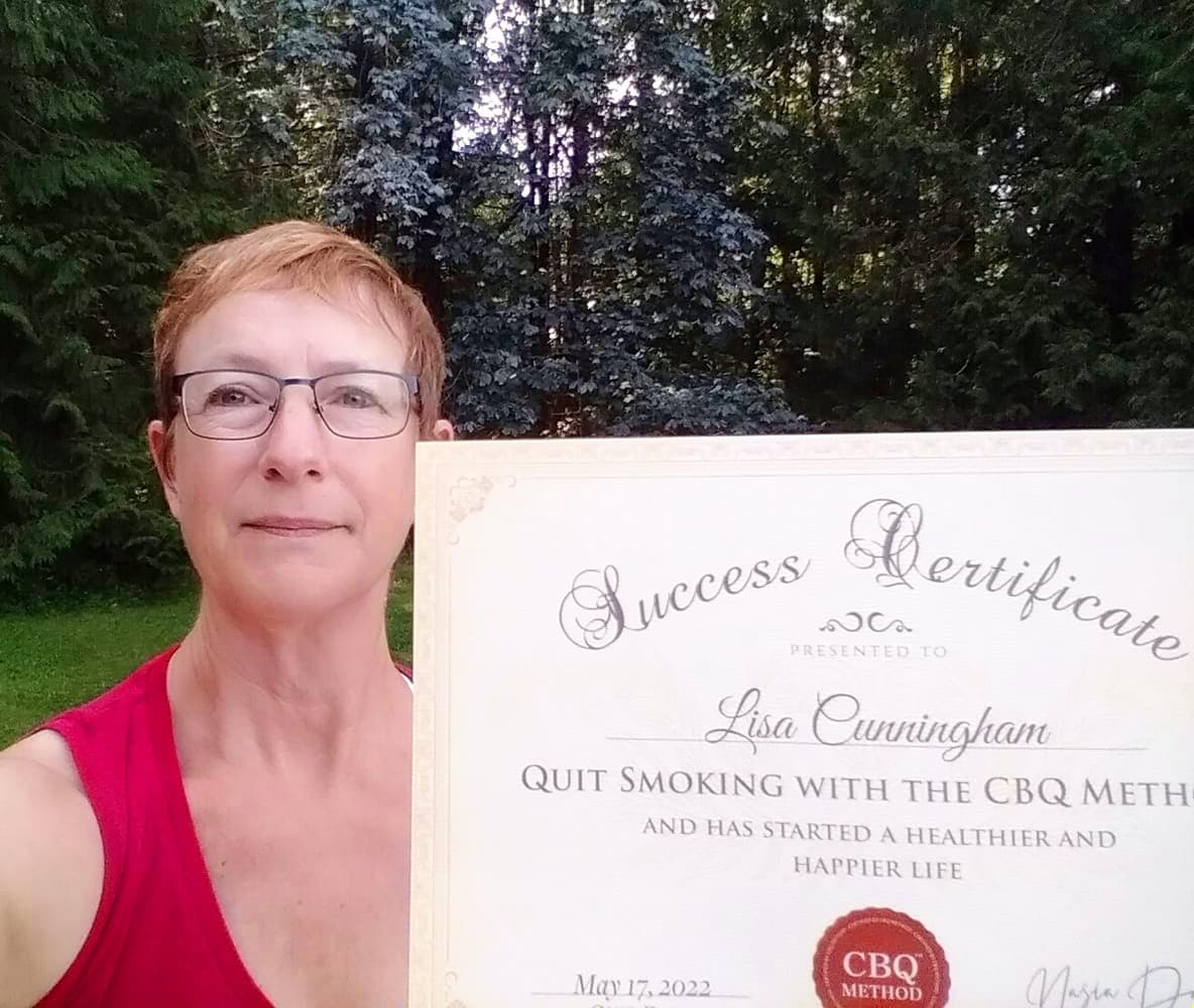 CBQ Nicotine Freedom Program member Lisa Cunningham holding her CBQ Success Certificate