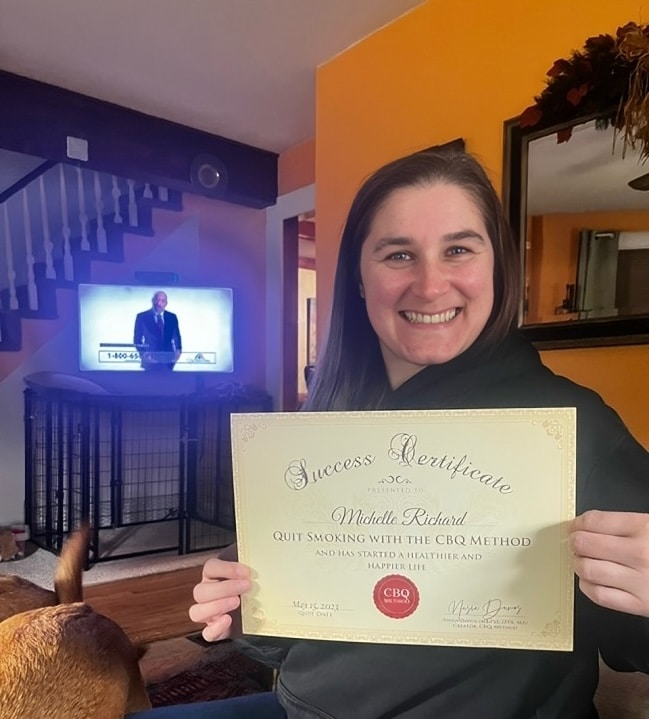 CBQ Nicotine Freedom Program member Michelle Richard holding her CBQ Success Certificate