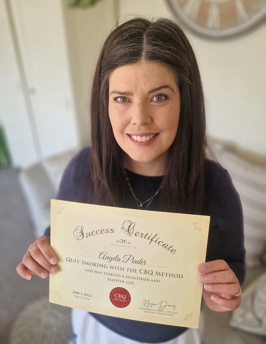 CBQ Nicotine Freedom Program member Angela Pinder holding her CBQ Success Certificate
