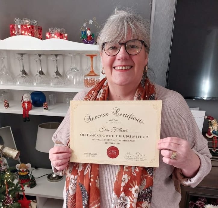 CBQ Nicotine Freedom program member Samantha Fallows holding her CBQ Success Certificate