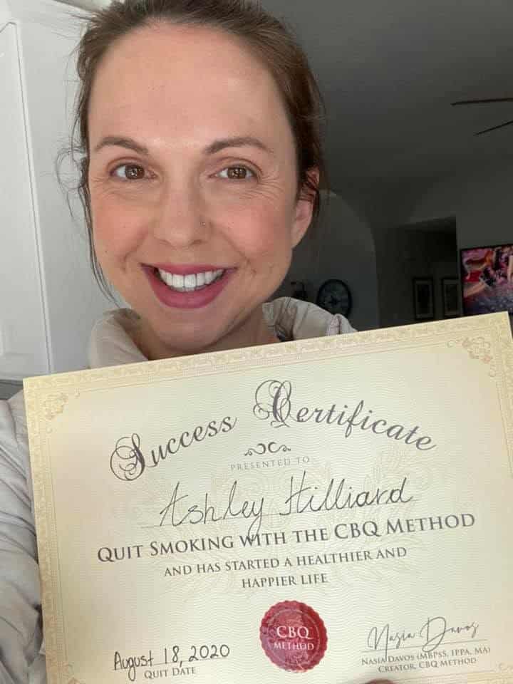 CBQ Nicotine Freedom Program member Ashley Hilliard holding her CBQ Success Certificate