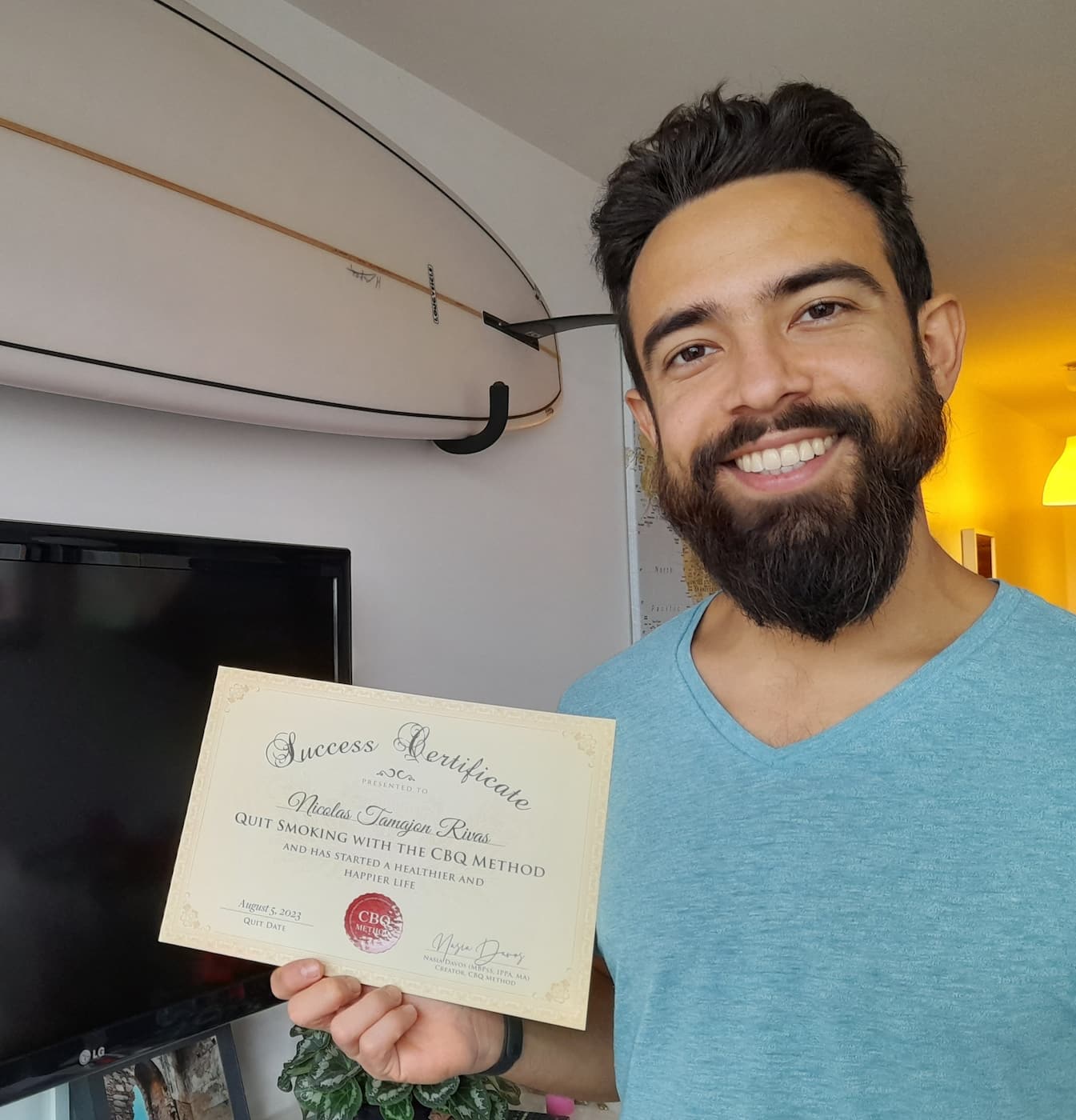CBQ Nicotine Freedom Program member Nicolas Tamajon holding his CBQ Success Certificate