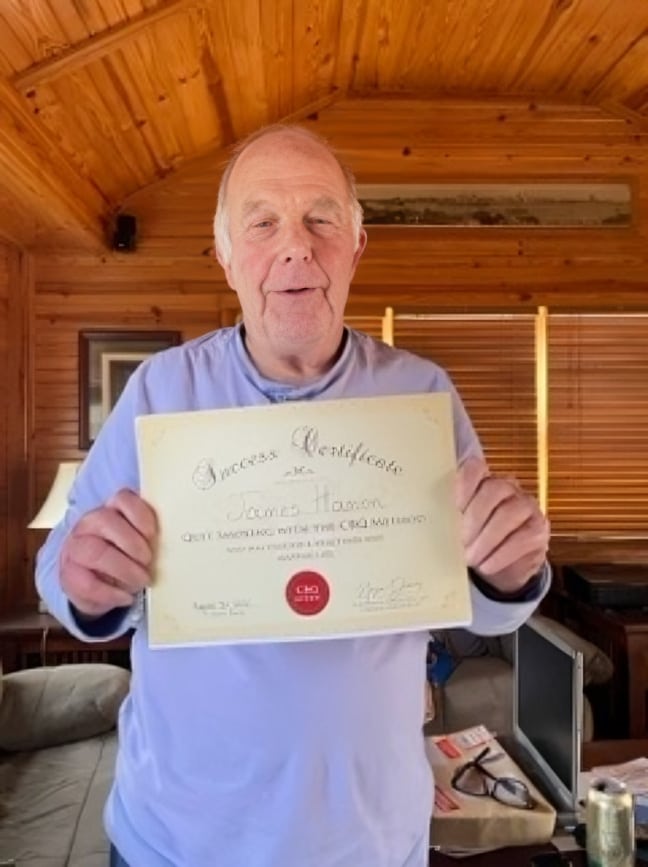 CBQ Nicotine Freedom Program member Jim Hamon holding his CBQ certificate