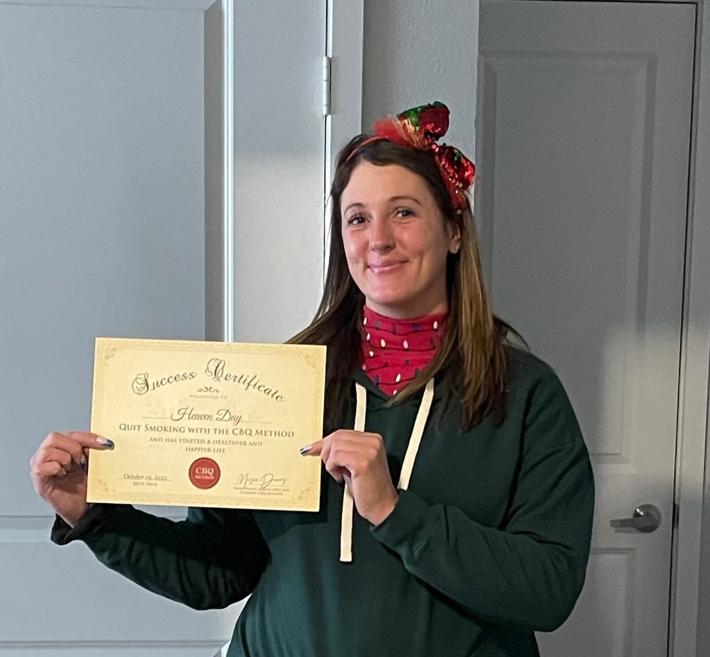 CBQ Nicotine Freedom Program member Heaven Leigh Day holding her CBQ Freedom Certificate