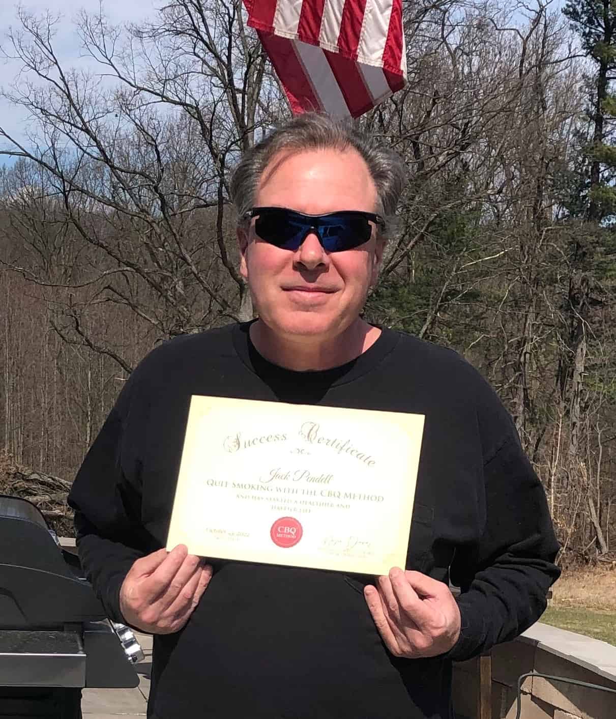 CBQ Nicotine Freedom Program Member Jack Pendell holding his CBQ Freedom Certificate