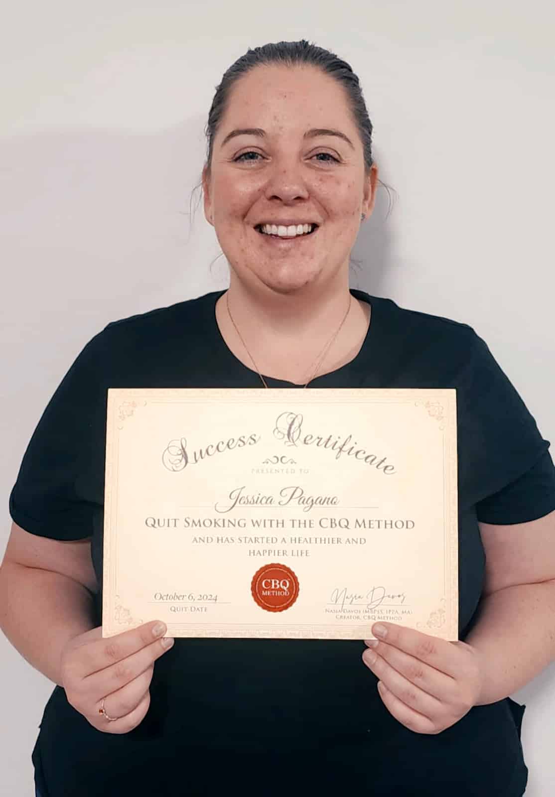 CBQ Nicotine Freedom Program member Jessica Pagano holding her CBQ Freedom Certificate