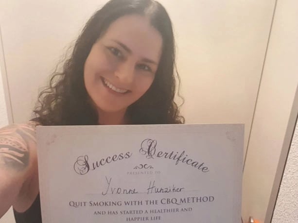 CBQ Nicotine Freedom Program Member Yvonne Hunziker holding her CBQ Freedom Certificate